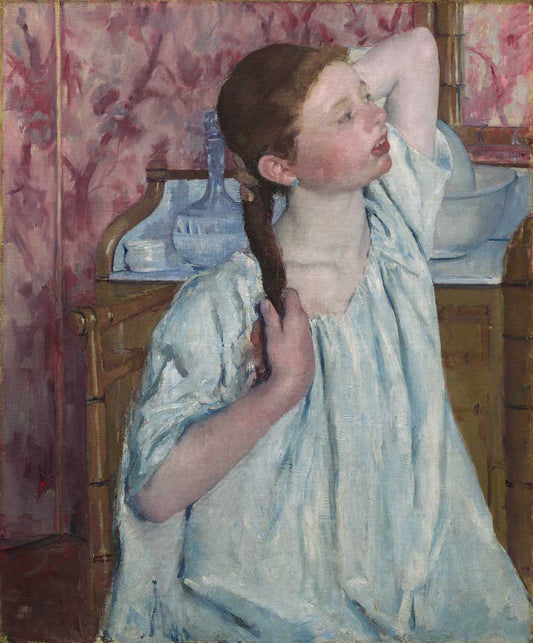 Girl Arranging Her Hair by Mary Cassatt 1886