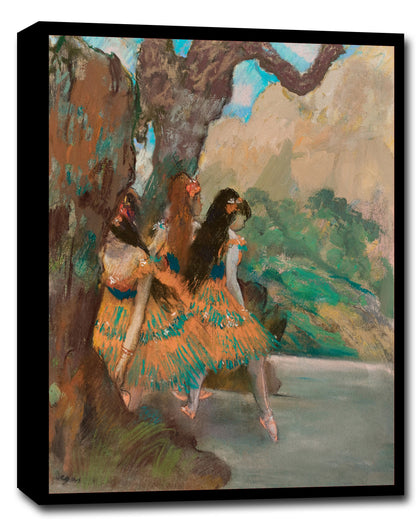 A framed print of 'Ballet Dancers' by Edgar Degas featuring two ballerinas in colorful skirts against a pastoral backdrop.