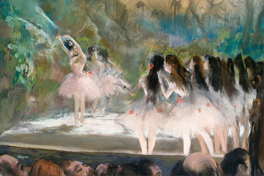 A framed print depicting a scene of ballet dancers on stage, with a colorful backdrop and a black frame.