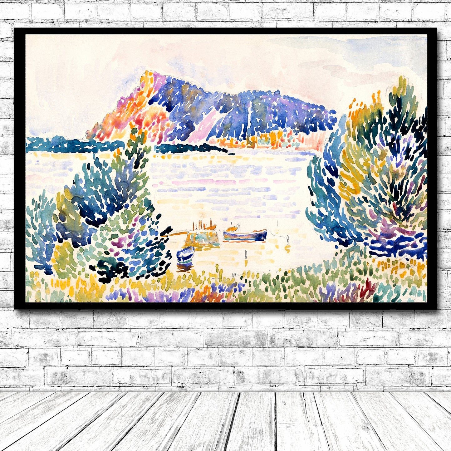 A framed print of a colorful landscape painting featuring a vivid depiction of trees, hills, and a body of water with a boat.