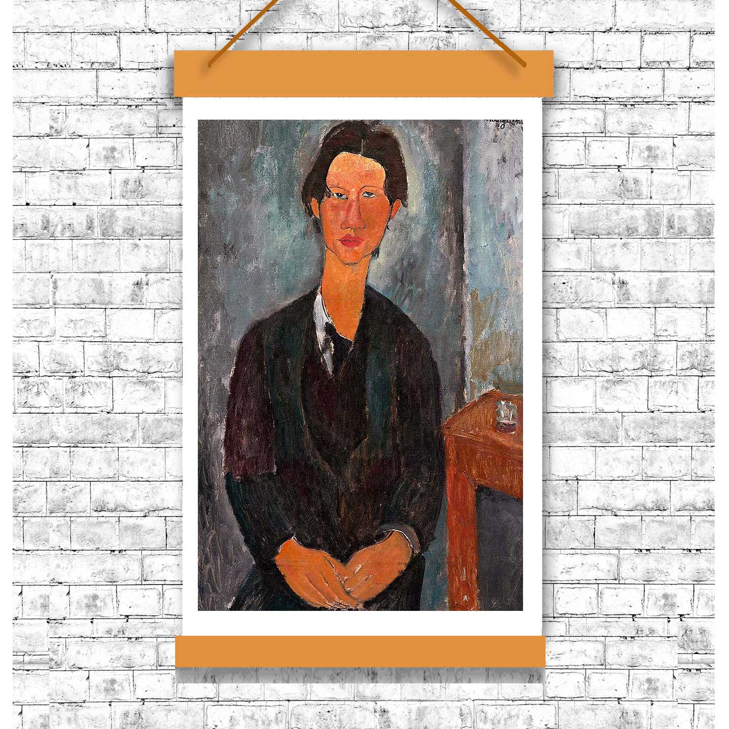 A framed portrait painting of a person wearing a dark jacket, with a simple interior background.