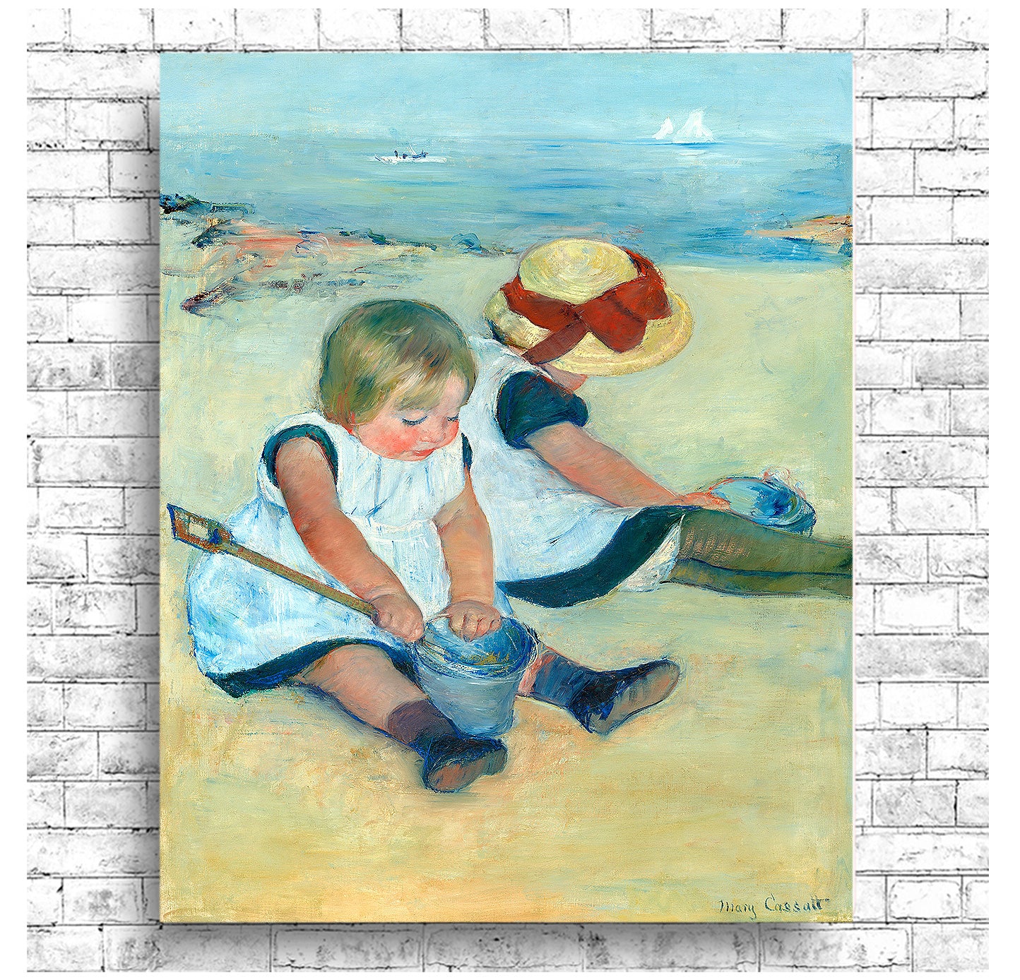 A framed print depicting two children playing on a beach, with vibrant colors and a focus on the children against a softer background.