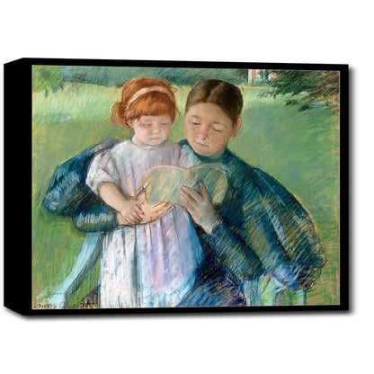 A framed print depicting two young girls, one holding a book, with a focus on soft, muted colors.