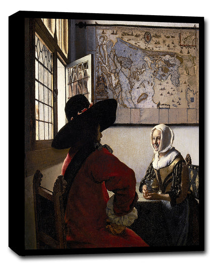 A framed print of Johannes Vermeer's painting 'Officer and Laughing Girl', featuring a man in a red coat and wide-brimmed hat conversing with a woman in a white dress, with a map in the background.