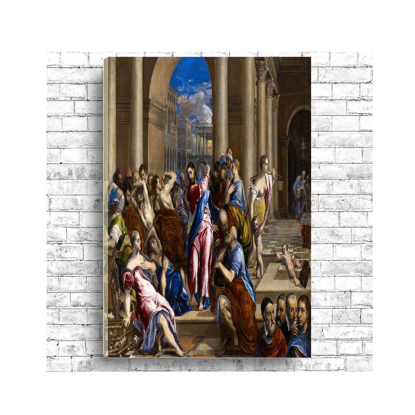 A printed art piece depicting a historical painting scene with multiple figures, framed in a black frame, displayed against a white brick wall background.