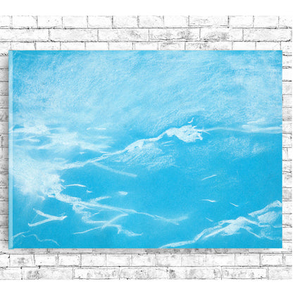 A framed print of a seagull over waves, with a black border and a clear frame.