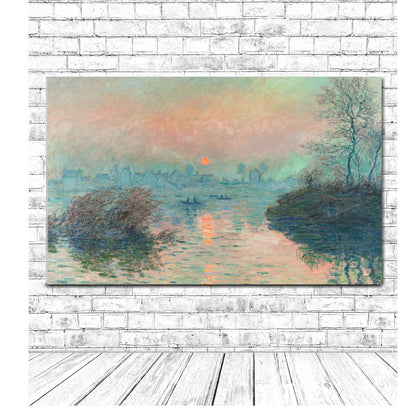 A framed print of a landscape painting depicting a sunset over a river with trees in the foreground.