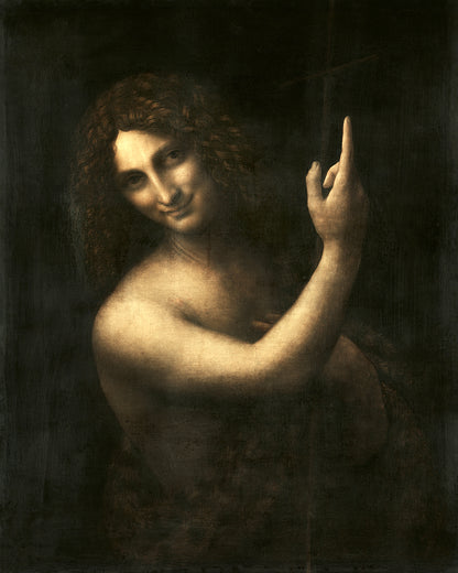 A framed print of 'Saint John the Baptist' by Leonardo Di Vinci, showing the subject with a finger pointing upwards, in a dark and moody portrait style.