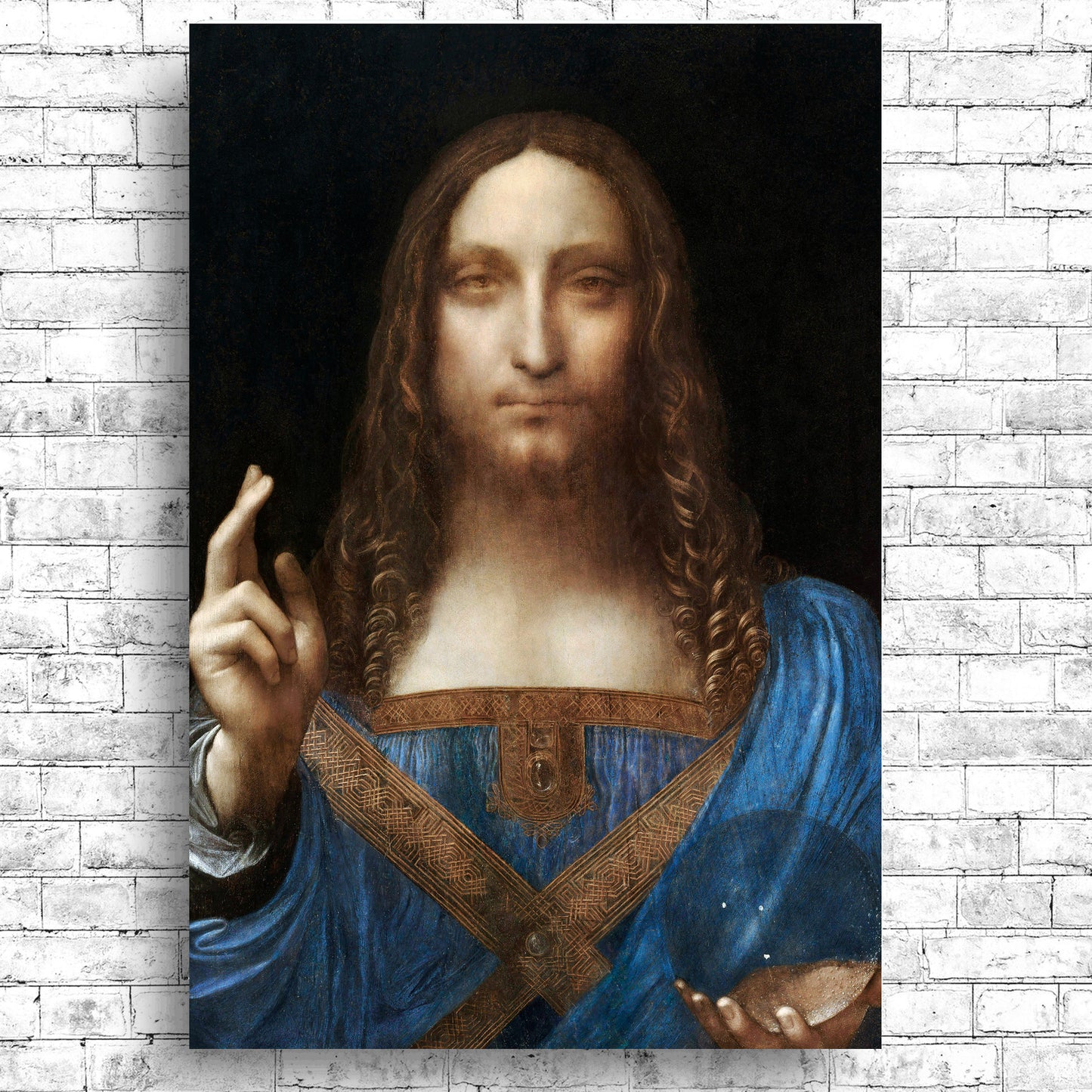 A framed print of 'Salvator Mundi' by Leonardo di Vinci, depicting Jesus Christ with a blue garment and gold detailing.