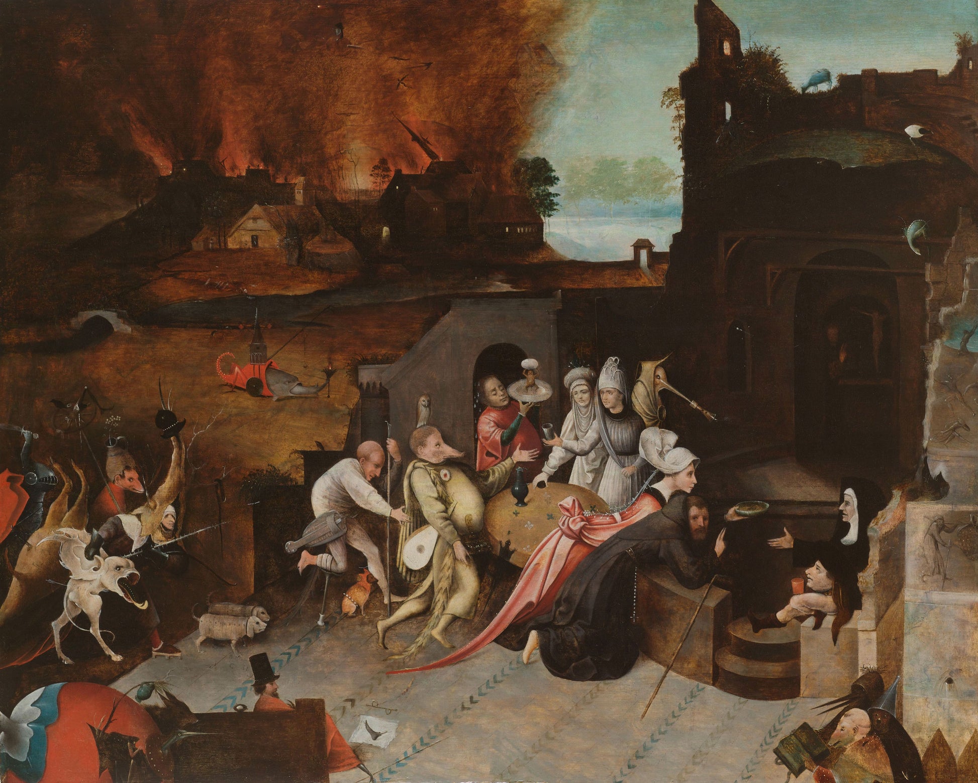 A framed print featuring 'The Temptation of St. Andrew' by Hieronymus Brueghel, depicting a religious scene with multiple figures.