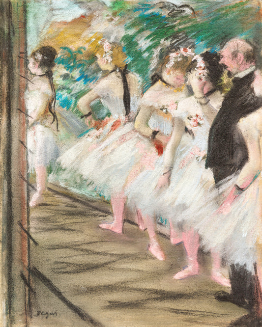 A framed print of 'The Ballet' by Edgar Degas, depicting ballerinas preparing on stage, with a black border and wooden frame.