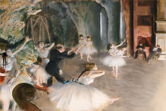 A framed print of 'The Rehearsal Onstage (1874)' by Edgar Degas, depicting a scene with several ballet dancers in a practice room.