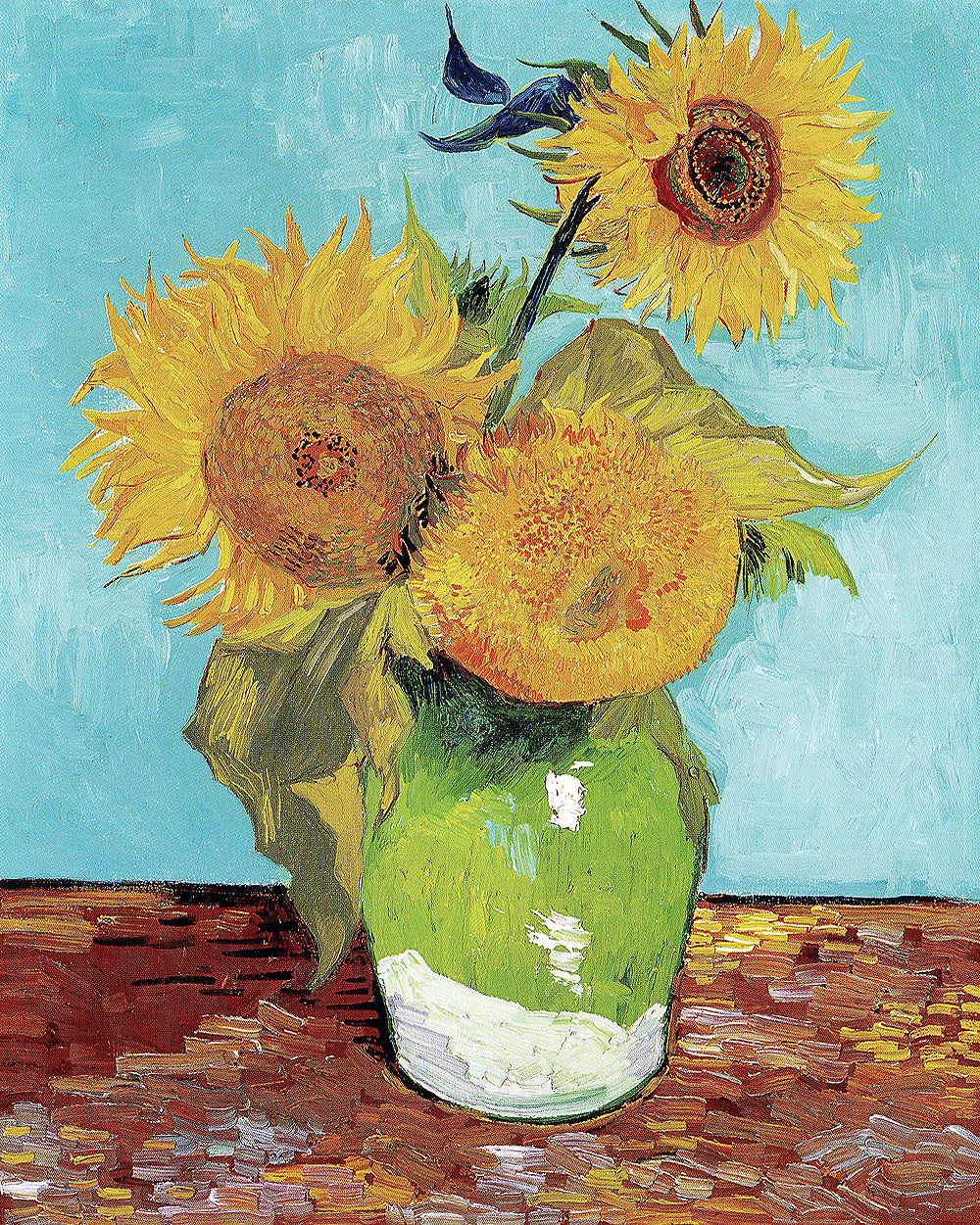 A printed artwork of three sunflowers in a vase, after Vincent Van Gogh's painting.