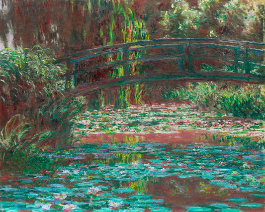 A framed print of 'Water Lily Pond' by Claude Monet, depicting a bridge over a pond with lily pads, surrounded by greenery.