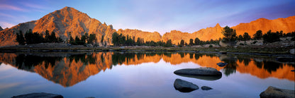 White Cloud peaks reflect into a small lake on the Windy Devil Pass
