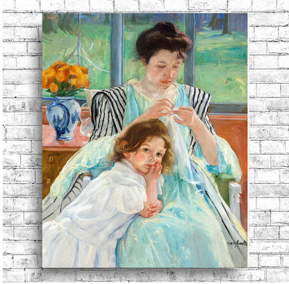 A framed print depicting a mother and child, with the mother sewing. The child is sitting beside her, looking towards the viewer.