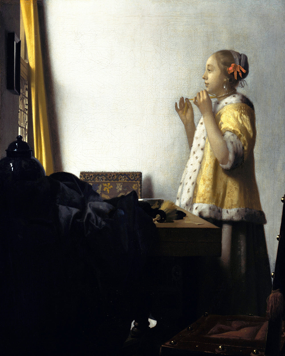 Young Woman with a Pearl Necklace by Johannes Vermeer