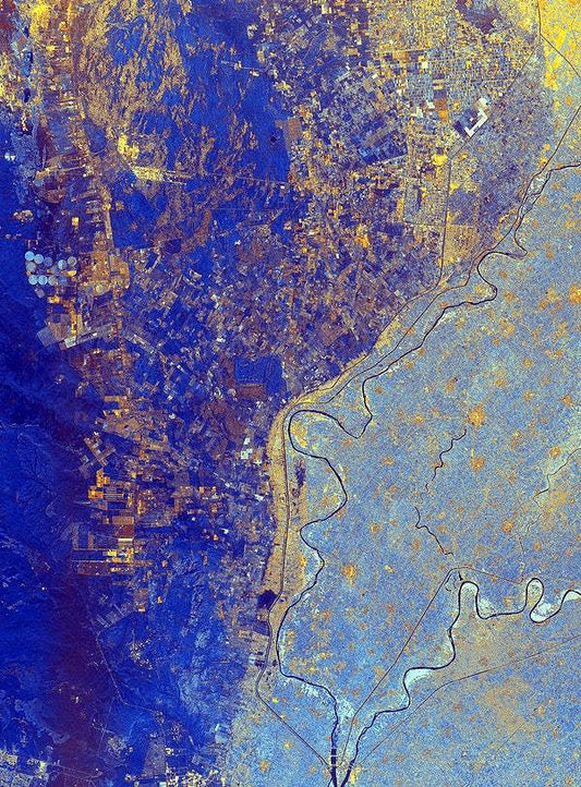 A satellite image of Cairo, Egypt, showing the cityscape and surrounding areas with a focus on urban development.