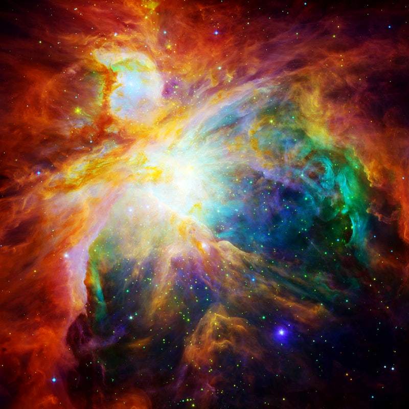 A vibrant and colorful image of a nebula cloud in space, featuring a mix of orange, red, blue, and green hues with bright star-like points scattered throughout.