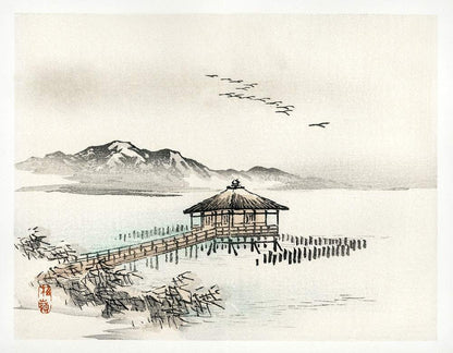 A traditional Japanese ink and wash painting depicting a cottage by the sea with mountains in the background and birds flying.
