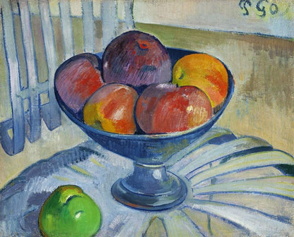 A printed artwork depicting a bowl of fruits placed on a garden chair, reflecting the style of artist Paul Gauguin.